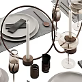 Elegant Modern Tableware Set Featuring Gray Plates Black Napkins Wine Glasses Cutlery And Candle Holders