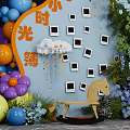 Decorative Photo Check In Spot With Clouds Photo Frames Colorful Balloons Greenery And Wooden Horse