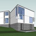 Modern Residential Building With Glass Windows And Stone Base On Green Lawn