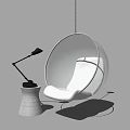 Modern Transparent Hanging Chair With White Cushion And Concrete Base Table Lamp