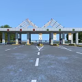 Toll Plaza Structure with Canopy Lanes Signs and Green Trees Under Blue Sky