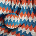 Colorful Woven Textiles Featuring Geometric Patterns And Vibrant Diamond Stripe Designs