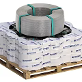 Gray Strapping Roll Secured With Green Straps On Wooden Pallet With ORTNER Packaging