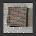 Brown Wicker Basket With Lid On White Square Base And Woven Texture 3d model