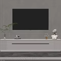 Modern White TV Stand With Flat Screen TV Green Plant And Decorative Items