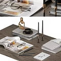 Elegant Decorative Ornament Set With Open Magazines Eyeglasses Golden Figurine And Notebooks On Wooden Tabletop