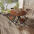 Home Balcony Design With Wooden Round Table Foldable Chairs Green Plants And Lantern