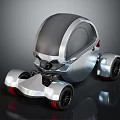 Futuristic Silver Concept Car With Dark Roof And Red Accented Wheels