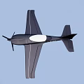 Black Model Airplane with Propeller White Circular Section Flying in Clear Blue Sky