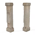 Two Classical Stone Columns Featuring Textured Surface And Weathered Details