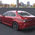 Red Toyota Sedan Modern Exterior Design With LED Headlights And Alloy Wheels