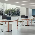 Modern Public Office Space With Desks Computers Ergonomic Chairs Large Windows And Natural Light