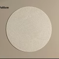 Poliform Cream Colored Round Area Rug With Textured Woven Design On Beige Backdrop