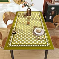 Elegant Dining Table Set With Green White Checkered Tablecloth Rattan Chairs And Decorative Tableware