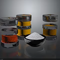 Glass Spice Jars With Metal Lids Containing Red Orange Brown Spices And White Powder Bowl
