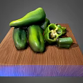 Fresh Green Bell Peppers On Wooden Cutting Board With Sliced Pieces