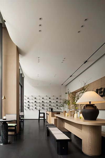 Modern Café Interior Design With Wall Shelves Green Plants And Warm Lighting 3d model