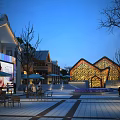 Modern Sales Office Building at Night with Lighting Glass Curtain Wall Plaza Seats and Trees