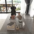 Decorative Inflatable Model Display On Desk With Stacked Books Wooden Art And Plants