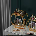 Two Circular Gold Green Multi Tier Racks Holding Perfume Skincare Bottles Makeup Brushes Eyeshadow Palettes