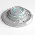 Silver Metallic Activation Device With Layered Circular Design And Blue Glowing Rings