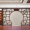 Traditional Chinese Wooden Display Cabinet Featuring Circular Arch Porcelain Tea Sets And Green Plants