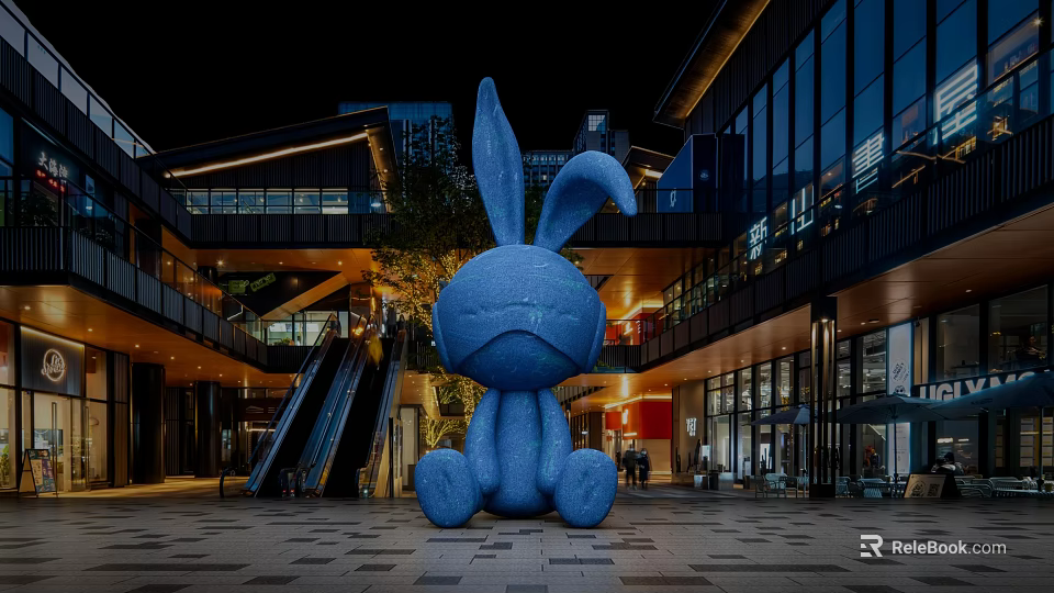 Blue Rabbit Inflatable Model In Outdoor Commercial Plaza At Night With Buildings Escalator And Lighting 3d model 