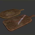 Food Preparation With Two Wooden Cutting Boards And Blue Bladed Knife