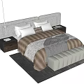 Modern Double Bed with Beige Headboard Pillows Bedding Nightstands Lamp and Bench on Gray Rug