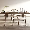 Modern Wooden Tea Table and Chairs with Green Plant Tea Set on Carpeted Floor