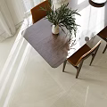 Modern Restaurant Interior Featuring Dining Table Chairs Plants Pendant Light And Natural Light