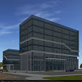Modern Office Building with Glass Curtain Wall and Surrounding Lawn Near Road with Parked Vehicles
