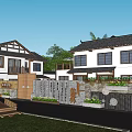 Traditional Chinese Architecture With White Walls Black Roofs Stone Walls And Wooden Cart