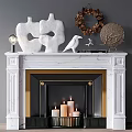 White Marble Fireplace With Gold Accents Candles And Mantel Decor Sculptures Bird Figurines Wreath