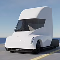 White Tesla Semi Truck Driving On Road With Aerodynamic Exterior Design