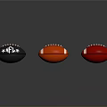 Vibrant Black Orange Red Rugby Balls Displayed On Gray Background Surface