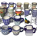 Various Colorful Ceramic Mugs with Diverse Patterns and Unique Designs