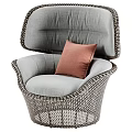 Modern Wicker Leisure Chair with Light Gray Cushion and Pink Pillow