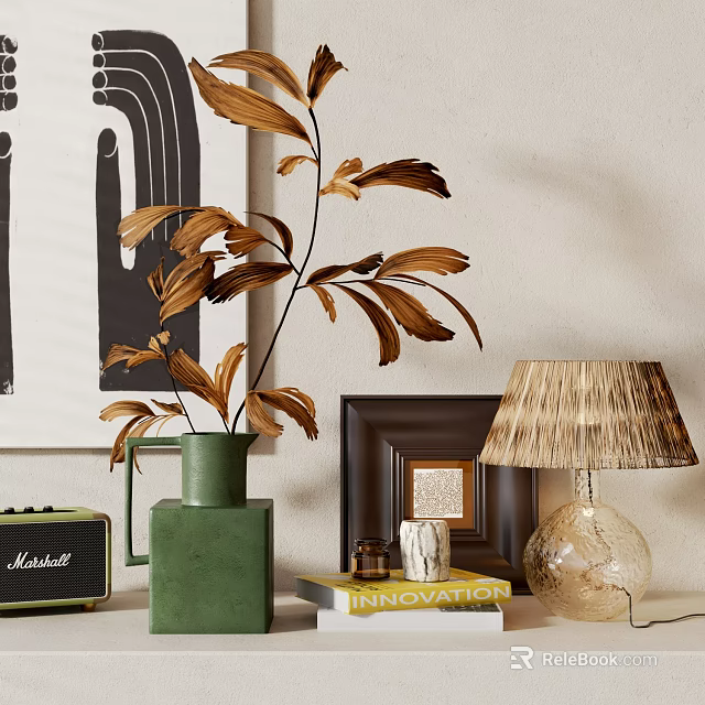 Stylish Decorative Ornament Set With Green Vase Dried Leaves Picture Frame Table Lamp Books And Marshall Speaker 3d model 