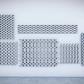 Decorative Grille Panels In Various Patterns On White Wall With Gray Floor 3d model