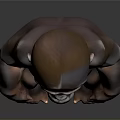 Realistic Brown Baby Gorilla Sculpture In Sitting Posture With Smooth Surface And Gray Background