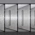 Modern Glass Partition With Metal Frame And Perforated Pattern On Gray Concrete Wall