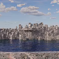 Garden Landscape With Natural Rock Formations Green Lawn And Blue Pond