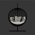 Black Rattan Spherical Hanging Chair With White Cushions And Circular Base
