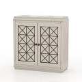 Light Colored Double Door Shoe Cabinet Featuring Geometric Pattern And Decorative Trim