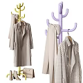 Stylish Yellow And Purple Coat Racks With Coats Scarves And Handbag