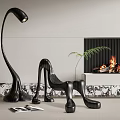 Modern Black Single Chair With Curved Design And Fireplace In Living Room