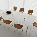 Modern White Conference Table With Brown Rolling Chairs And Water Bottles In Meeting Room