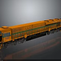 Orange Model Train With Green Trim And Black Wheels On Gray Reflective Surface