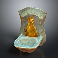 Golden Statue In Shell Shaped Marble Container With White And Brown Patterns